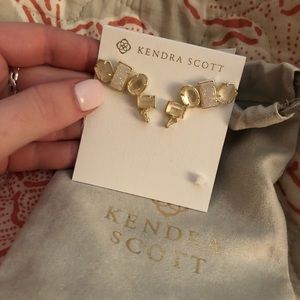 Kendra Scott crawler earrings.